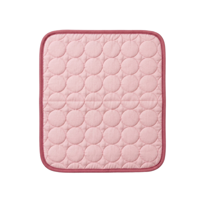 Pink quilted ice silk dog cooling pad on a white background