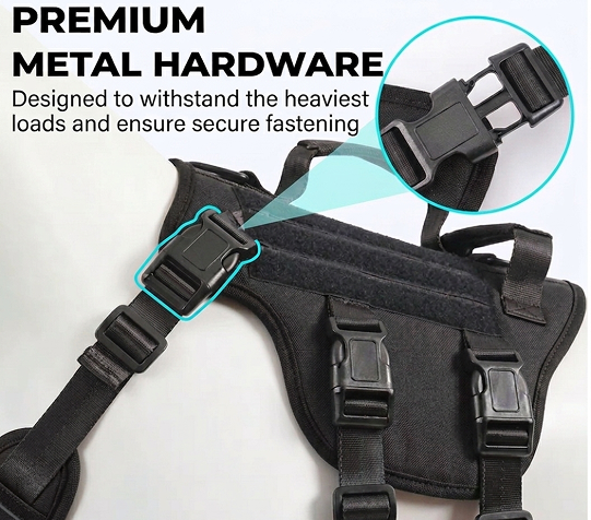 Black dog harness with premium metal hardware on a white background
